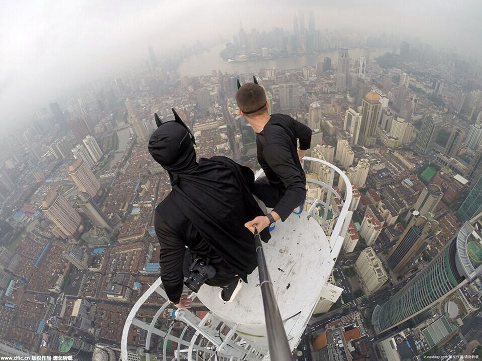 Batmen took selfies on the top of SH Jin Mao Tower (2)