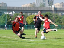 Play Irish football with hands and feet!