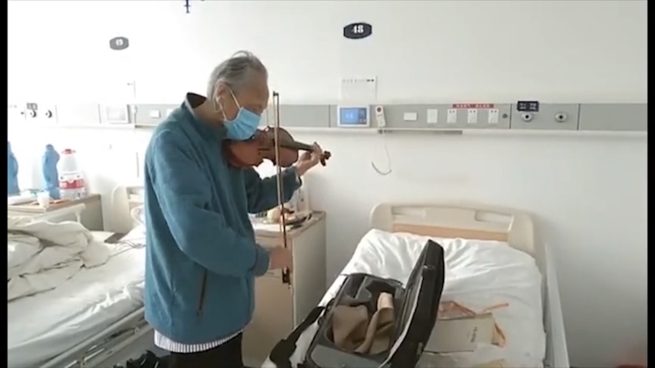 Recovering patient sends off medics with violin music