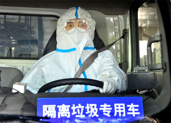 Quarantine waste cleaners sanitize on the frontline