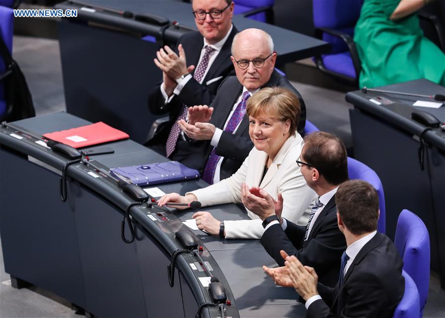 Roundup: Merkel narrowly re-elected as Germa