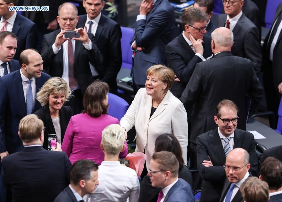 Roundup: Merkel narrowly re-elected as Germa